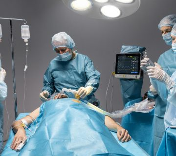 Different doctors doing surgical procedure patient 360x320